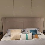 Panel-Stitched Leather Bed with Top Strap Details and High-Gloss Wooden Sides